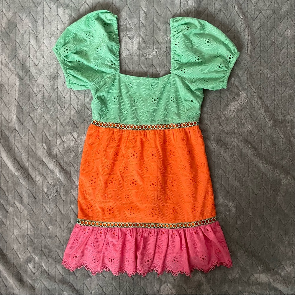 Anthropologie tiered mini dress with eyelet and flower detail